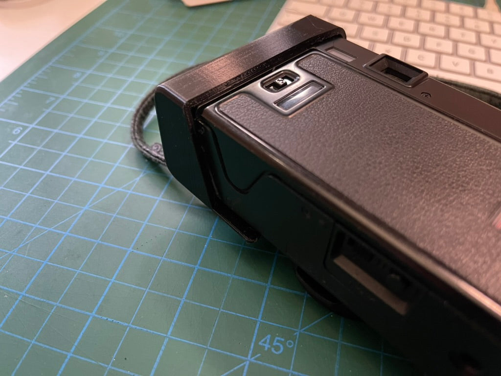Nikon L35AF battery flap door fix
