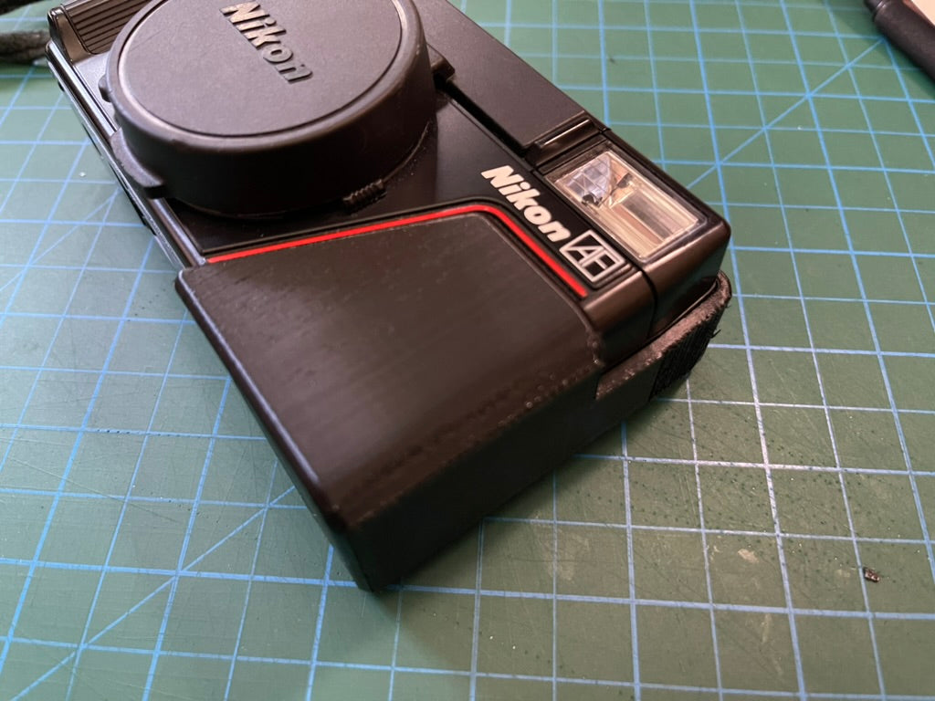 Nikon L35AF battery flap door fix